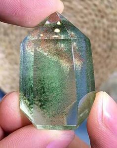 Speckled Ghost Crystal with fine starry inclusions evenly distributed throughout the quartz